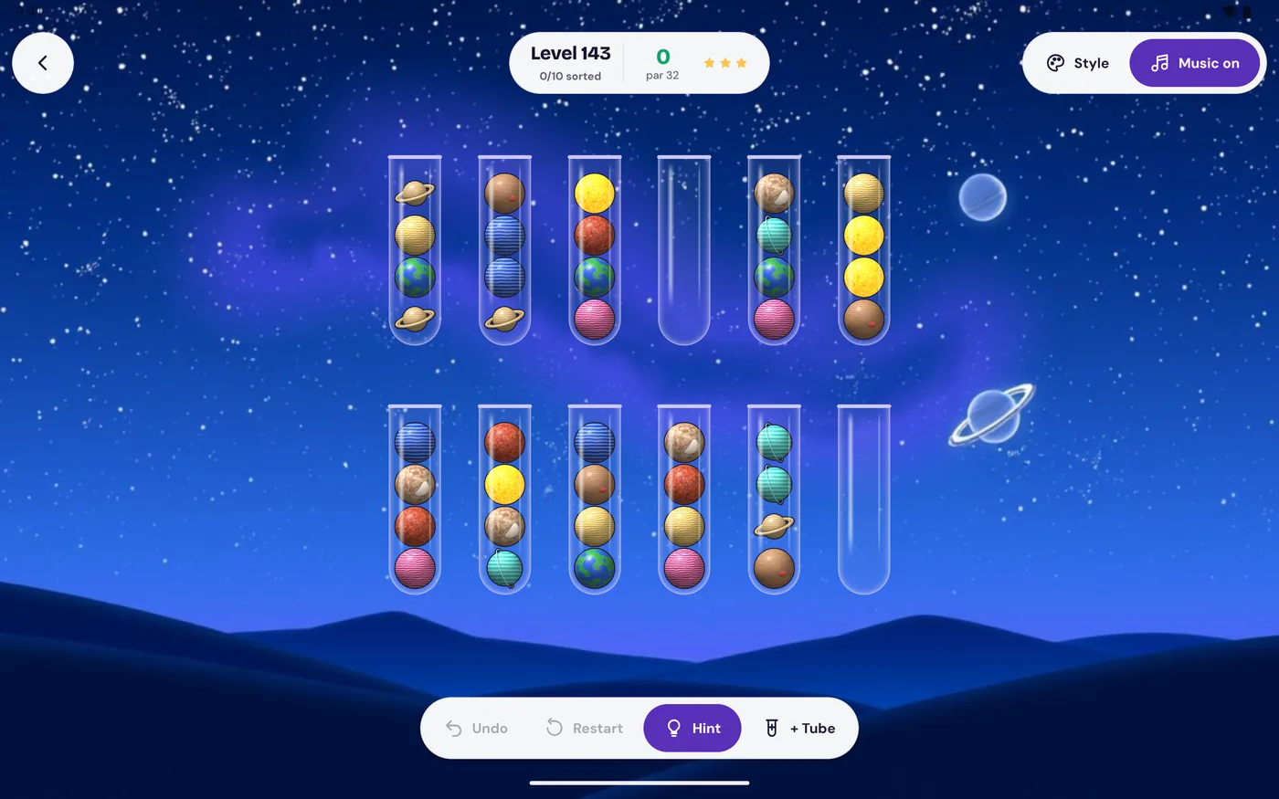 Hue Haven on a tablet: a wide board of space-themed balls