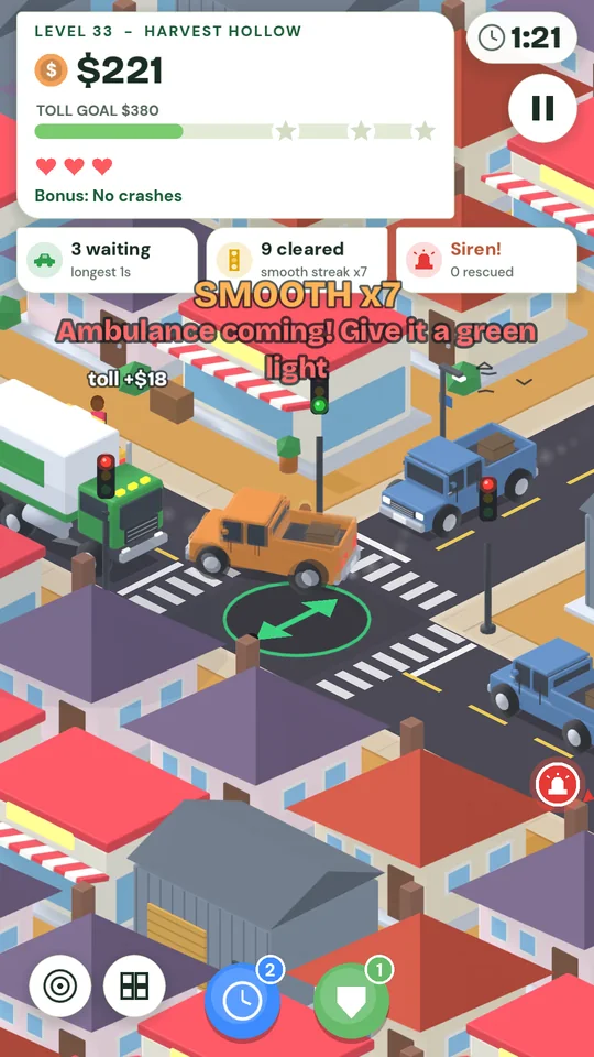 An ambulance with its siren on, coming through a junction